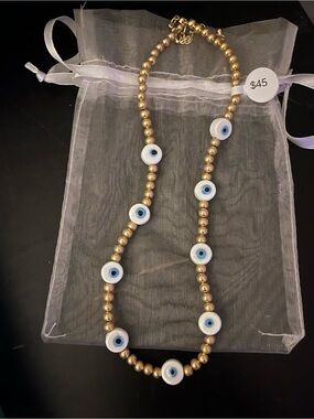 Gold Beaded Necklace with Blue Evil Eye Accents